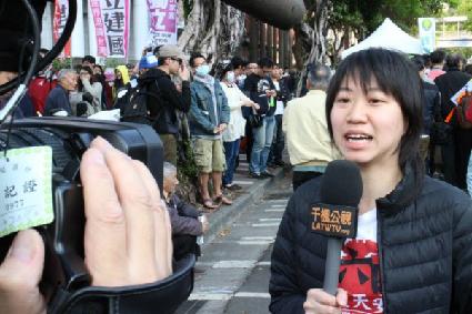 CWI comrade Sally Tang being interviewed on Taiwan TV