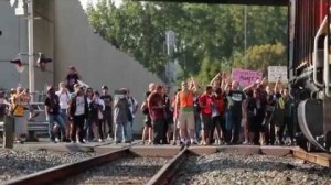 Protesters stop an oil train engine in Seattle on September 21st  (Screenshot of video by: DurianMD via reddit.com)
