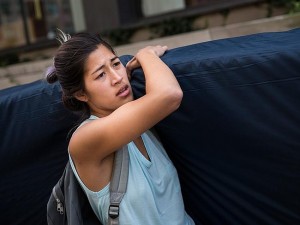 Emma Sulkowicz, a senior visual arts student at Columbia University, carries a mattress in protest of the university's lack of action after she reported being raped during her sophomore year. (Photo: AFP)