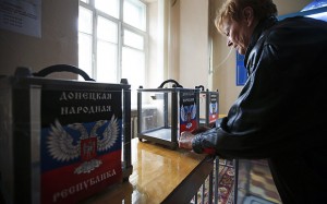 Member of a local electoral commission takes part in the preparations for the upcoming election in the rebel Republic of Donetsk. REUTERS/Maxim Zmeyev