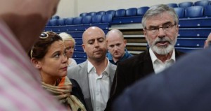 Sinn Féin leader Gerry Adams (right) tries to explain the defeat of candidate Cathal King (center), who lost to Paul Murphy  (Photo: Alan Betson/The Irish Times)