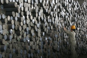 A Wuhan Iron & Steel laborer marked steel bars in China's Hubei province in 2007. Wuhan helped petition for China's steel inquiry. (Photo: Reuters)