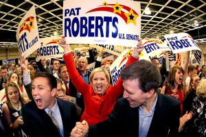 Supporters cheer before Kansas Sen. Pat Roberts makes his victory speech during a Republican watch party Tuesday, Nov. 4, 2014, in Topeka, Kan. (AP Photo/Charlie Riedel)