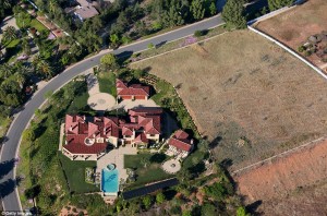 Lush lawns next to barren dry lands