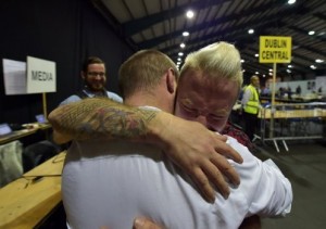 Gay couple who were married in Cape Town, South Africa embrace at the RDS count centre on May 23, 2015 in Dublin, Ireland. (Photo:  Charles McQuillan/Getty Images)