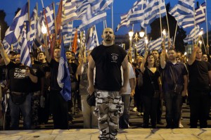Members of Golden Dawn chant the national anthem in front of the Greek parliament on May 29, 2013, during a rally marking the anniversary of the fall of Constantinople to the Ottoman Empire in 1453. (Photo: AFP / Stringer)