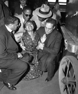 Mamie Till Mobley collapses when her son Emmett's body arrives at the old Illinois Central Railroad station after his torture and murder by racists in Mississippi. (Photo: Chicago Sun-Times Library)