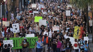 Demonstrators in the "March for Black Lives" march through the streets after passing the Emanuel African Methodist Episcopal Church in Charleston (Photo: Reuters / Brian Snyder)