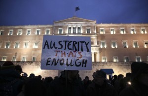 Syriza supporters gather in front of Greece?s Parliament to back its demands of a bailout debt renegotiation on February 11, 2015. (AP Photo/Yorgos Karahalis)