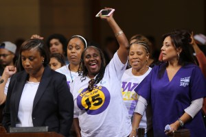 Workers in SEIU ULTCW, the United Long Term Care Workers Union demanding the Los Angeles City Council vote to raise the minimum wage on Tuesday, May 19, 2015, in Los Angeles (AP Photo / Damian Dovarganes)