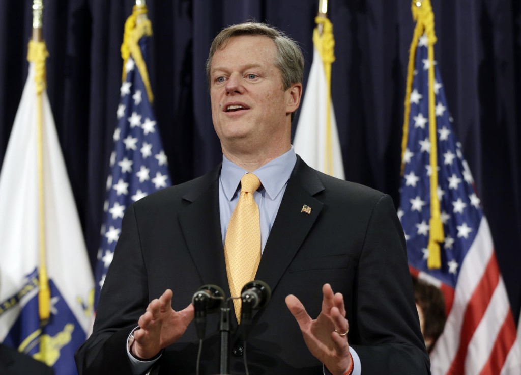 Gov. Charlie Baker speaks to reporters at a news conference at the Statehouse in Boston, Friday, Feb. 20, 2015 after naming a seven-member panel of experts in transportation, economic development and municipal planning to come up with a fix for the troubled MBTA. Baker said the panel will perform an "in-depth diagnostic review of the transit system's core functions." The T has been reporting some progress in restoring services crippled by a brutal stretch of winter weather. (AP Photo/Elise Amendola)