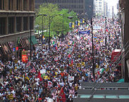 "May 1 2006 Rally in Chicago" by User Flcelloguy on en.wikipedia - Photo taken by Andy Thayer, Chicago Indymedia Center. Image is released into public domain: "CC. No rights reserved. This work is in the public domain.". Licensed under Public Domain via Commons - https://commons.wikimedia.org/wiki/File:May_1_2006_Rally_in_Chicago.jpg#/media/File:May_1_2006_Rally_in_Chicago.jpg