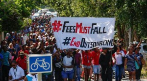 #FeesMustFall protestors tie austerity to other capitalist anti-worker initiatives like outsourcing.